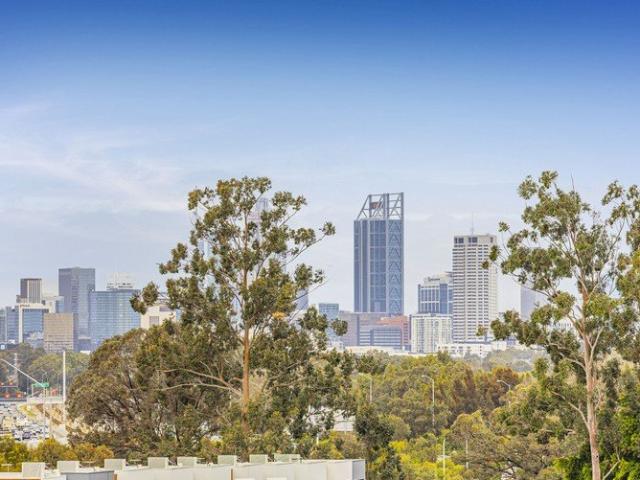 Spacious End Apartment with City Views