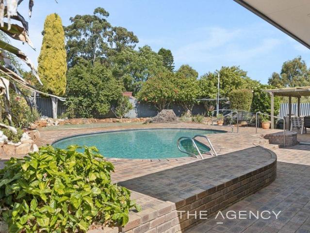 Spacious Family Abode in Quiet, Peaceful Location!
