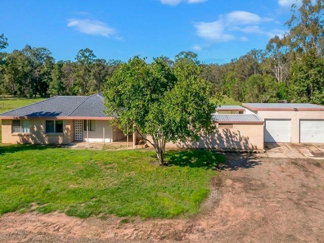 Spacious Family Acreage Living with Pool