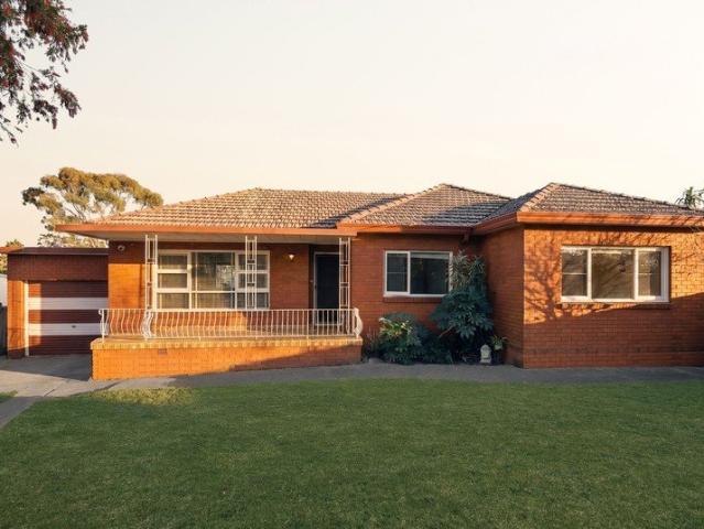 Spacious Family Brick Home On Generous Block with Expansive Garden