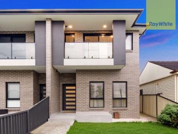 Spacious Family Duplex with Rare Dual Street Access