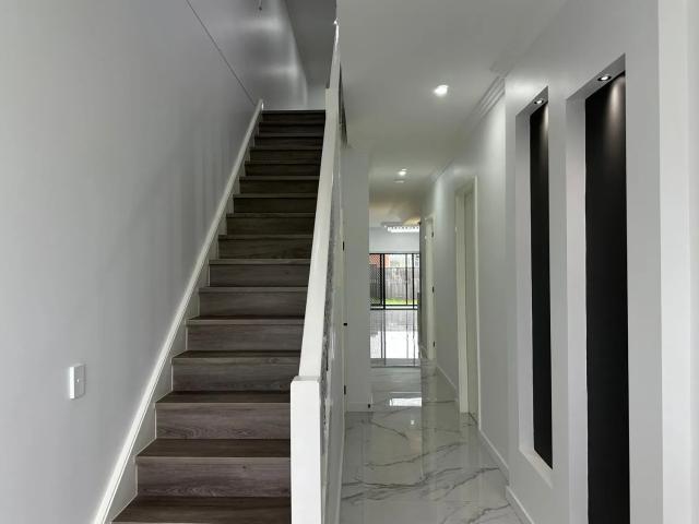 Spacious Family Home, 5 Bedrooms, Multiple Living Areas, High End Comforts!