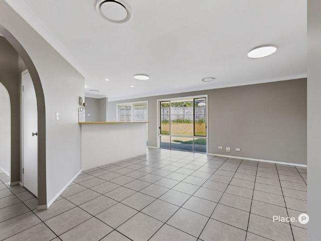 Spacious Family Home with Multiple Living Areas and Expansive Backyard
