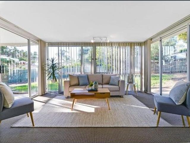 Spacious Family Home with Multiple Living Areas and Large Backyard