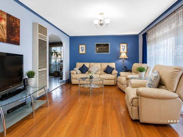 Spacious Family Home with Multiple Living Areas and Secure Parking