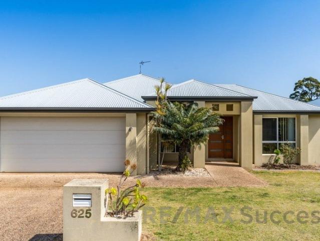 Spacious Family Home with Multiple Living Areas in Kearneys Spring