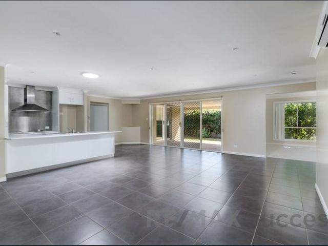 Spacious Family Home with Multiple Living Areas in Kearneys Spring