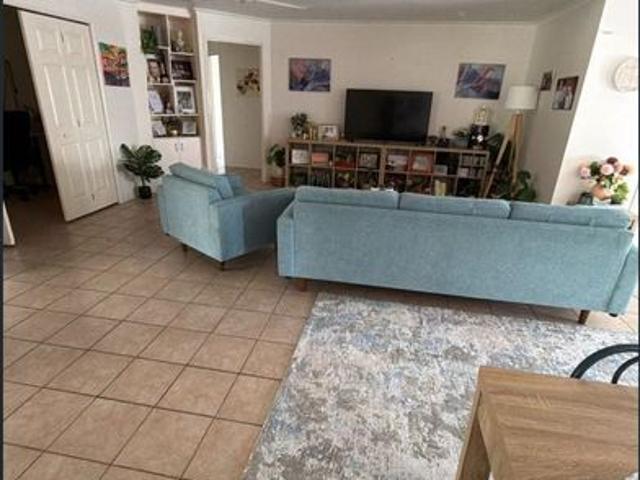 Spacious family home with multiple living areas, office & tropical outdoor living