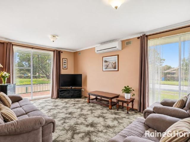 Spacious Family Home with a Generous Backyard!