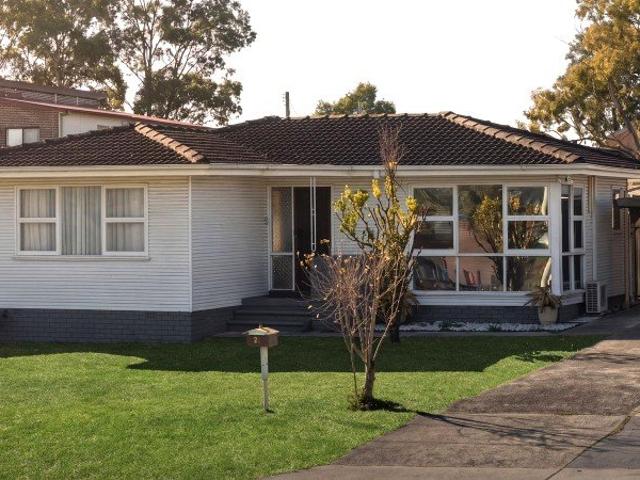 Spacious Family Home with Ample Natural Light and Outdoor Potential