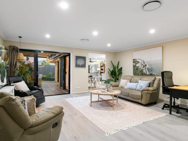Spacious Family Home with Exceptional Four Car Accommodation
