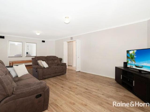 Spacious Family Home with Expansive Living Areas & Large In Ground Pool