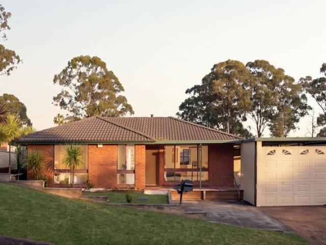 Spacious Family Home with Expansive Outdoor Deck in Tranquil Setting