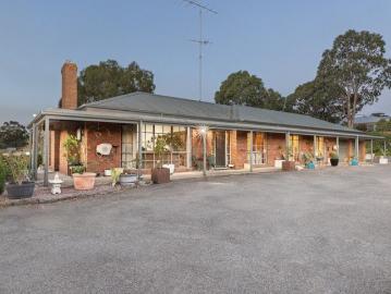 Spacious Family Home with Endless Potential on Over 1 Acre of Prime Land