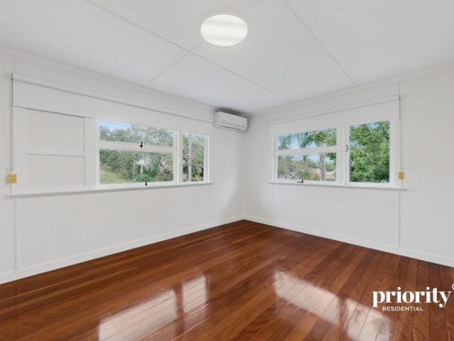 Spacious Family Home with Entertainer's Deck and Extensive Undercover Parking