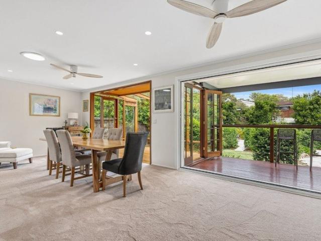 Spacious family home with entertainer's deck and lush gardens