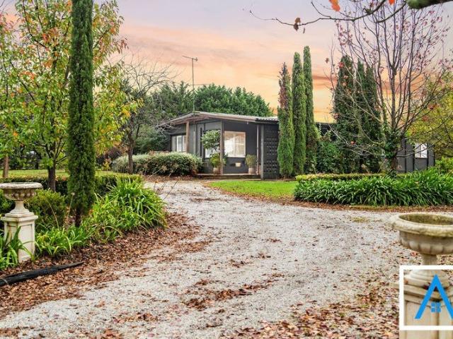 Spacious Family Home with Flexible Living on 10 Acres in a Rare Acreage Pocket