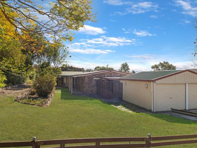 Spacious Family Home with Huge Backyard, Shed & 4 Car Parking