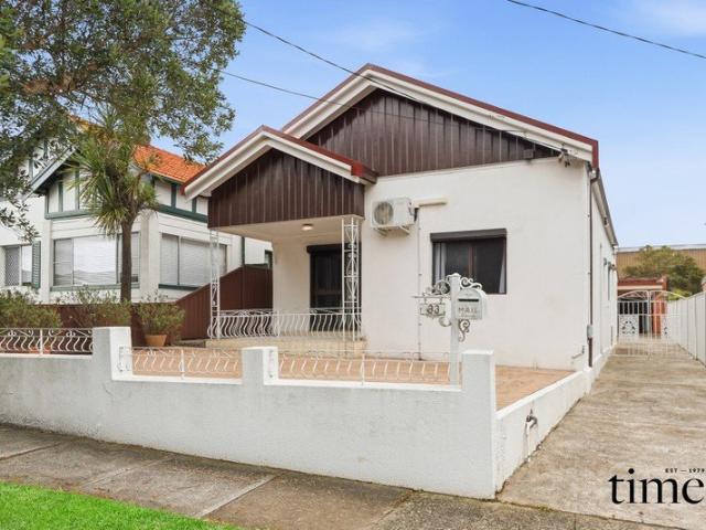 Spacious Family Home with Huge Garage and Endless Potential