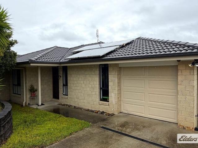 Spacious Family Home with Inground Pool & Large Fully Fenced Yard!