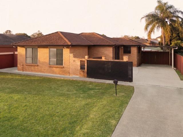 Spacious Family Home with Lush Backyard and Modern Amenities