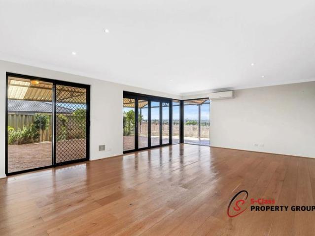 Spacious Family Home with Large Outdoor Entertaining Area & Elevated Views