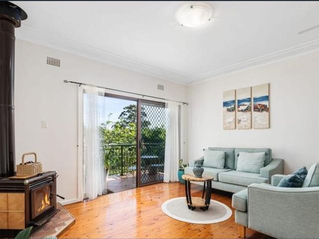 Spacious Family Home with Large Backyard Just Moments from the Water