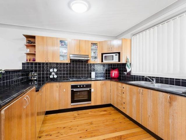 Spacious Family Home with Large Backyard