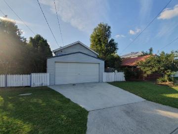 Spacious Family Home with Large Deck, Shed & Walk to Train