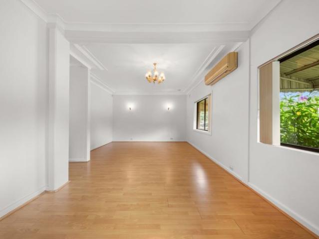 Spacious Family Home with Large Yard and Parking in a Prime Location