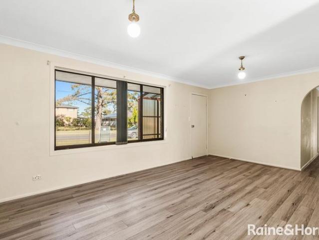 Spacious Family Home with Large Yard & Entertaining Deck