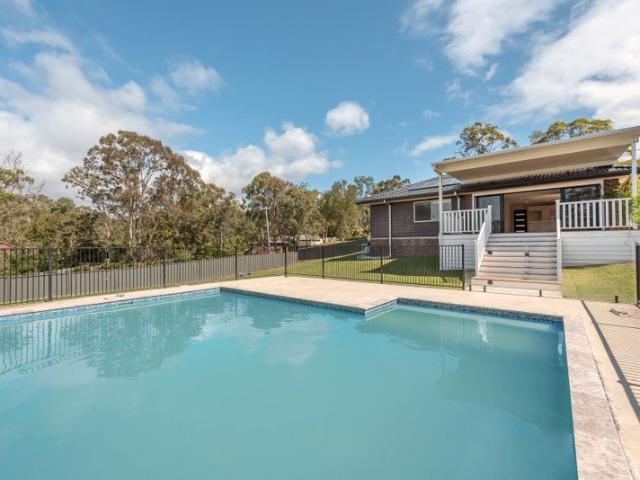 Spacious Family Home with Pool, Huge Yard & Acreage Feel