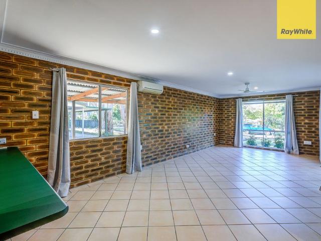 Spacious Family Home with Pool in a Leafy Setting