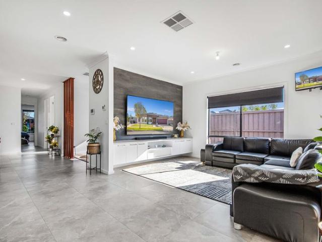 Spacious Family Home with Premium Features Throughout with a Gardener
