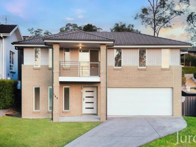 Spacious Family Home with Stunning Mountain Views!