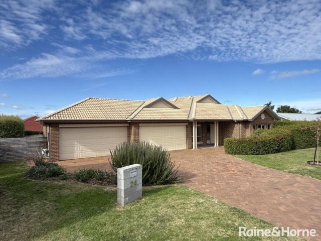 Spacious Family Home with Sundrenched Living Areas & a Quiet & Private Setting