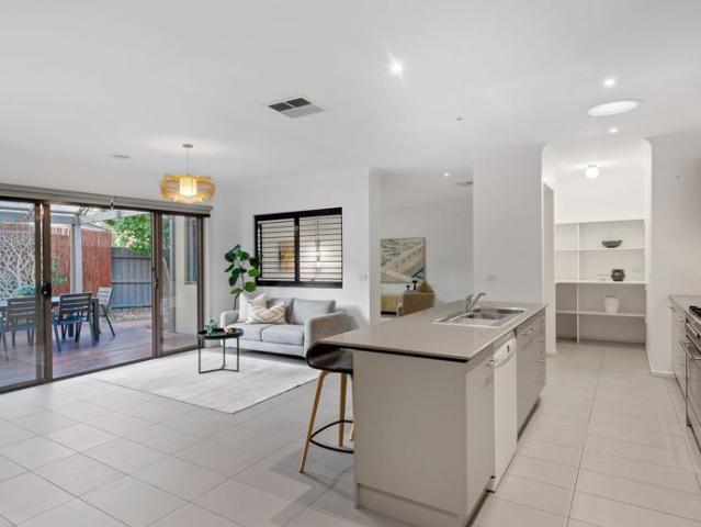 Spacious Family Home with Sunroom& Undercover Entertaining Area