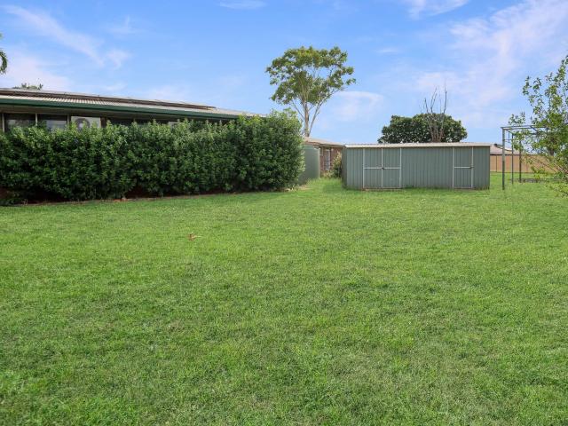 Spacious Family Home with Secure Yard, Solar Power and Multiple Outdoor Living Areas