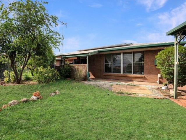 Spacious Family Home with Secure Yard, Solar Power and Multiple Outdoor Living Areas
