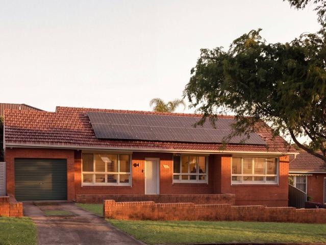 Spacious Family Home with Solar Panels and Expansive Backyard