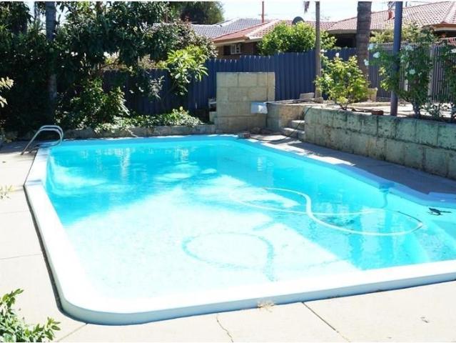 Spacious Family Home with Sparkling Pool & Luscious Gardens
