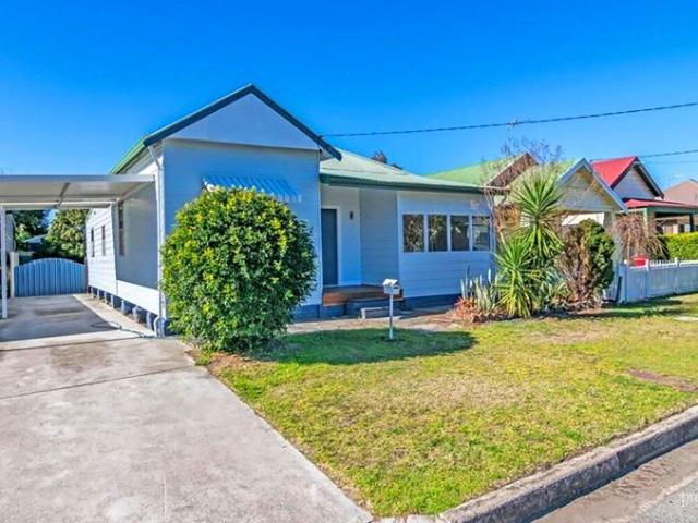 SPACIOUS FAMILY HOME WITH TWO LIVING AREAS AND HUGE YARD