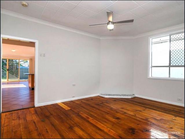 SPACIOUS FAMILY HOME WITH TWO LIVING AREAS AND HUGE YARD