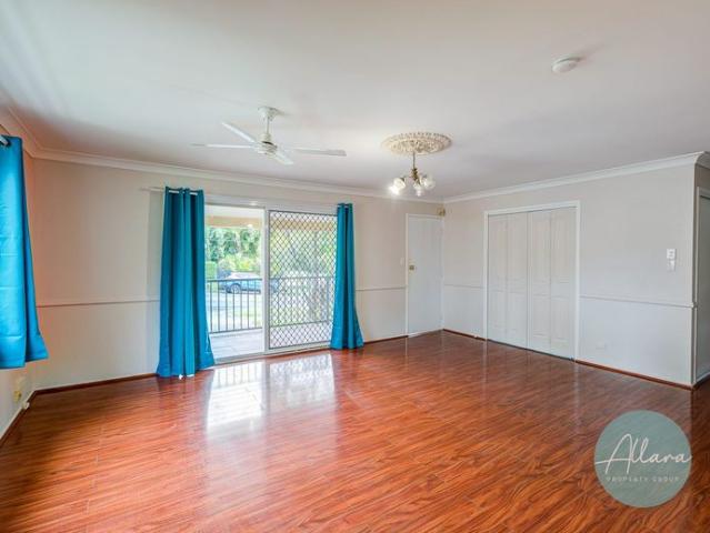 Spacious Family Home with Versatile Multi Generational Living in Prime Southport Location