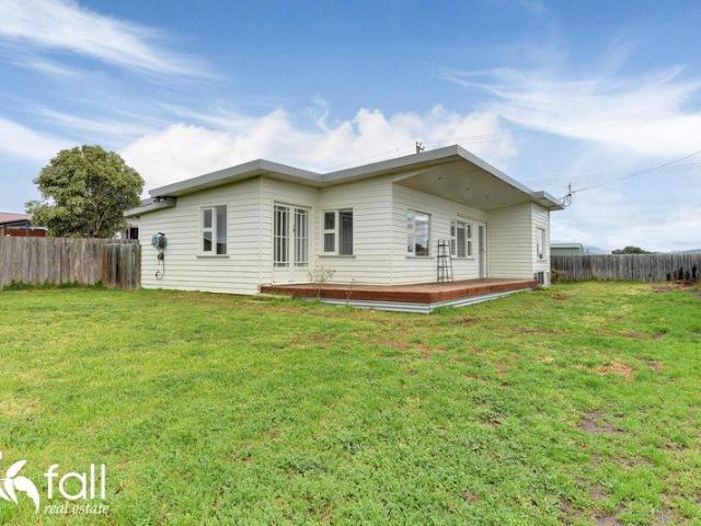 Spacious Family Home with Water Views And A Fully Fenced Yard