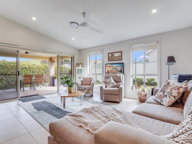 Spacious Family Home in the Prestigious Garden Gates Estate!