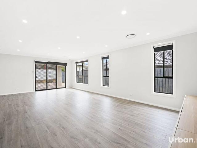 Spacious Family Home in a Convenient Minto Location