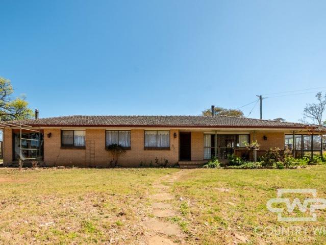 Spacious Family Home on 11 Acres with Town Water