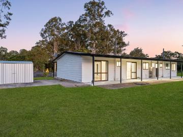 Spacious Family Home on a Flat 2.7 Acre Block!