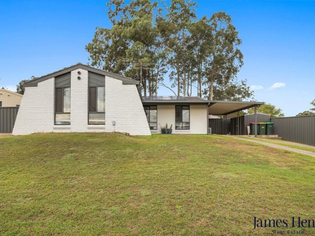 Spacious Family Home on a Large 855.6m² Block This is 6 Roselle close, Rutherford